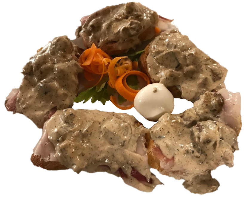 Bruschette con salsa cremosa e decorazione di carote.