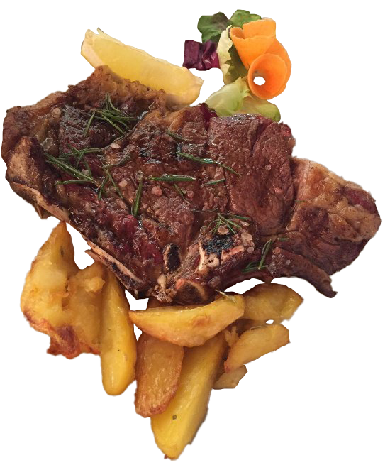 Bistecca con patate arrosto e decorazione di verdure.